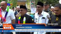 PJ BUPATI KAMPAR RESMIKAN KKBC MASUK DESA BPJS KETENAGAKERJAAN DI BULUH CINA